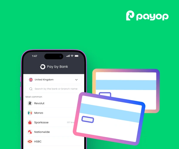 A smartphone screen shows a Pay by Bank app listing UK banks, including Revolut and HSBC. Two stylised credit cards float beside, on a green background.