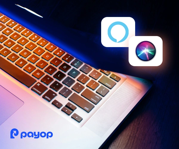 A laptop keyboard glows with a blue and orange hue; icons for Alexa and Siri float above. The Payop logo is in the bottom left, suggesting tech integration.